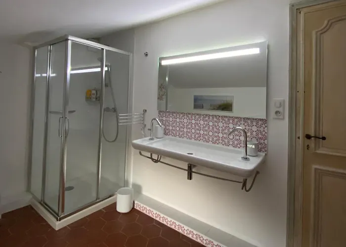 Les Palmiers Maison d'hôtes *